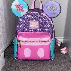 Loungefly Purple and Pink it’s a small world purse